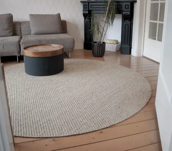 beige round sisal rug